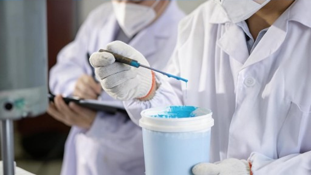 JIALAILE technicians developing and testing coating samples